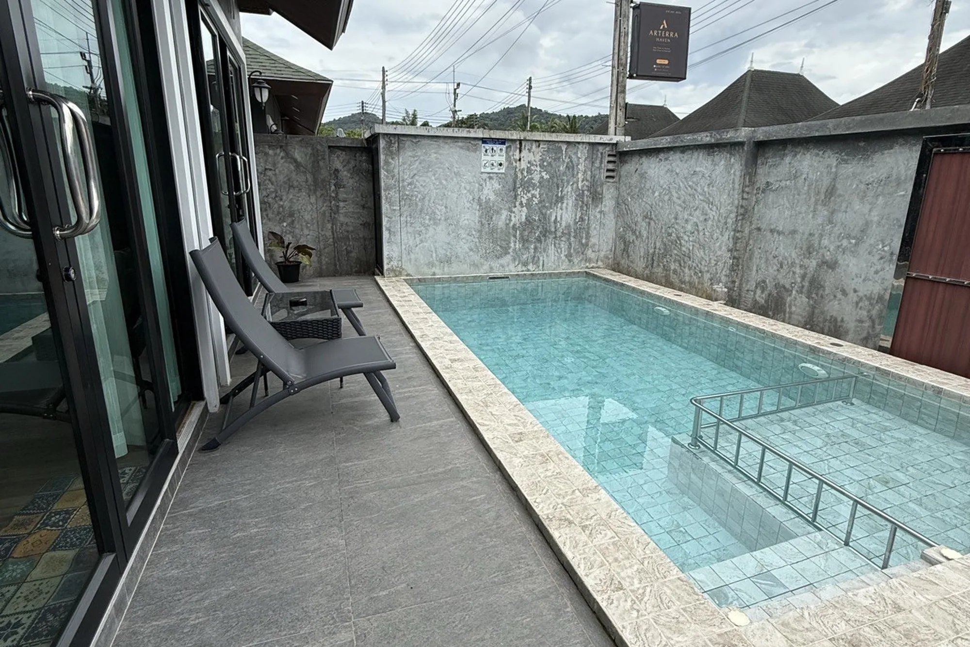 Private plunge pool with loungers